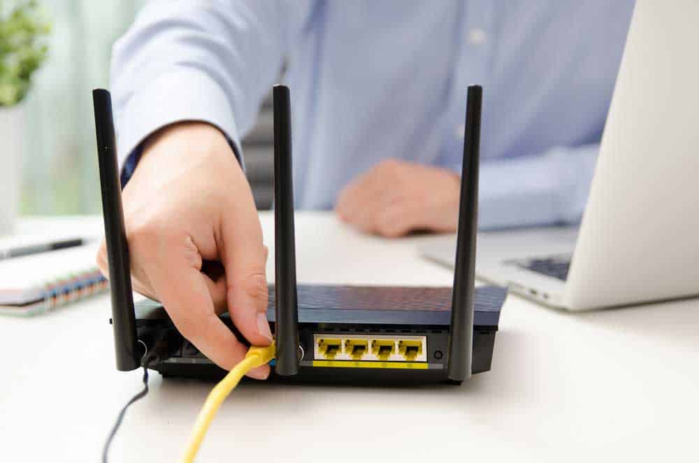 Man Connecting Third-Party Router 