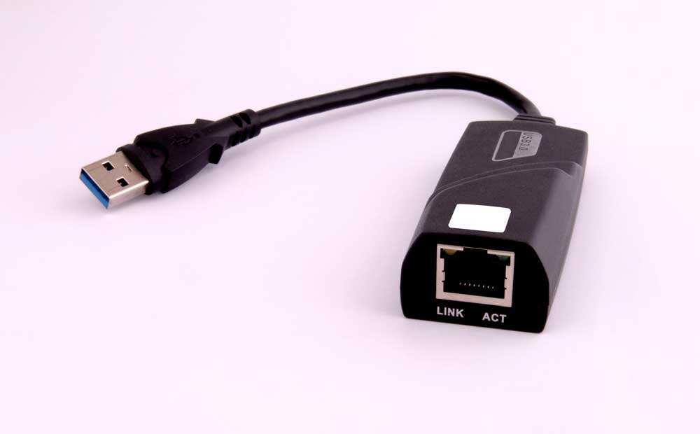 A USB connected to an Ethernet adapter