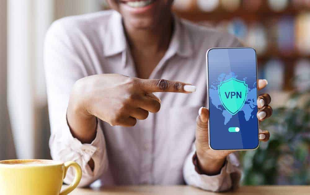 Woman pointing at VPN on her phone