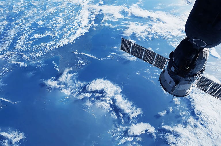 A space satellite above the Earth’s surface