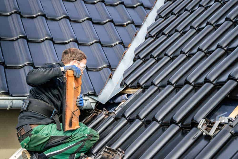 Craftsman removing a roof
