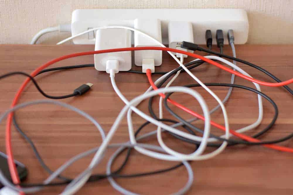 Charging Cables Tangled on a Table